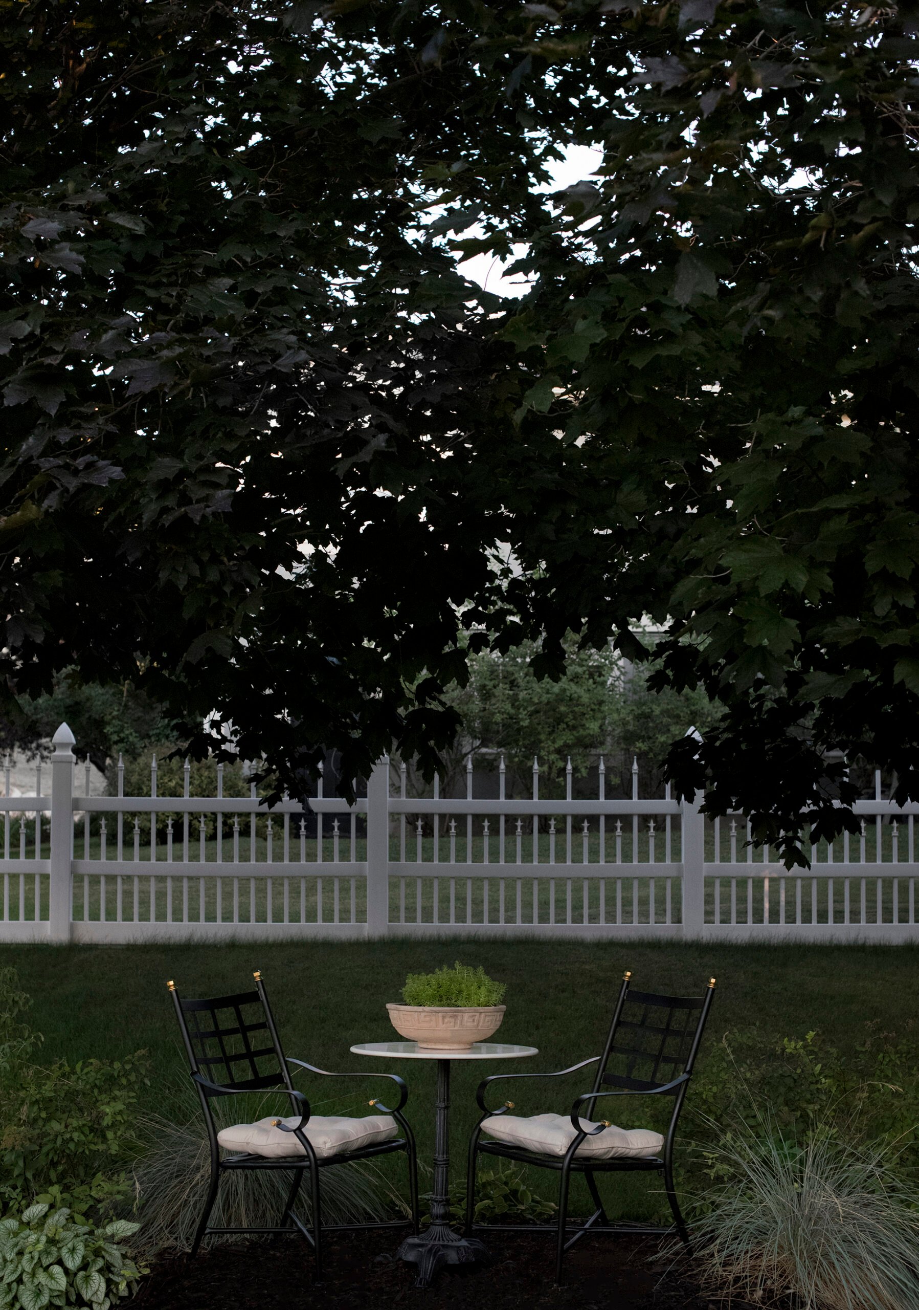 Bistro chairs in yard