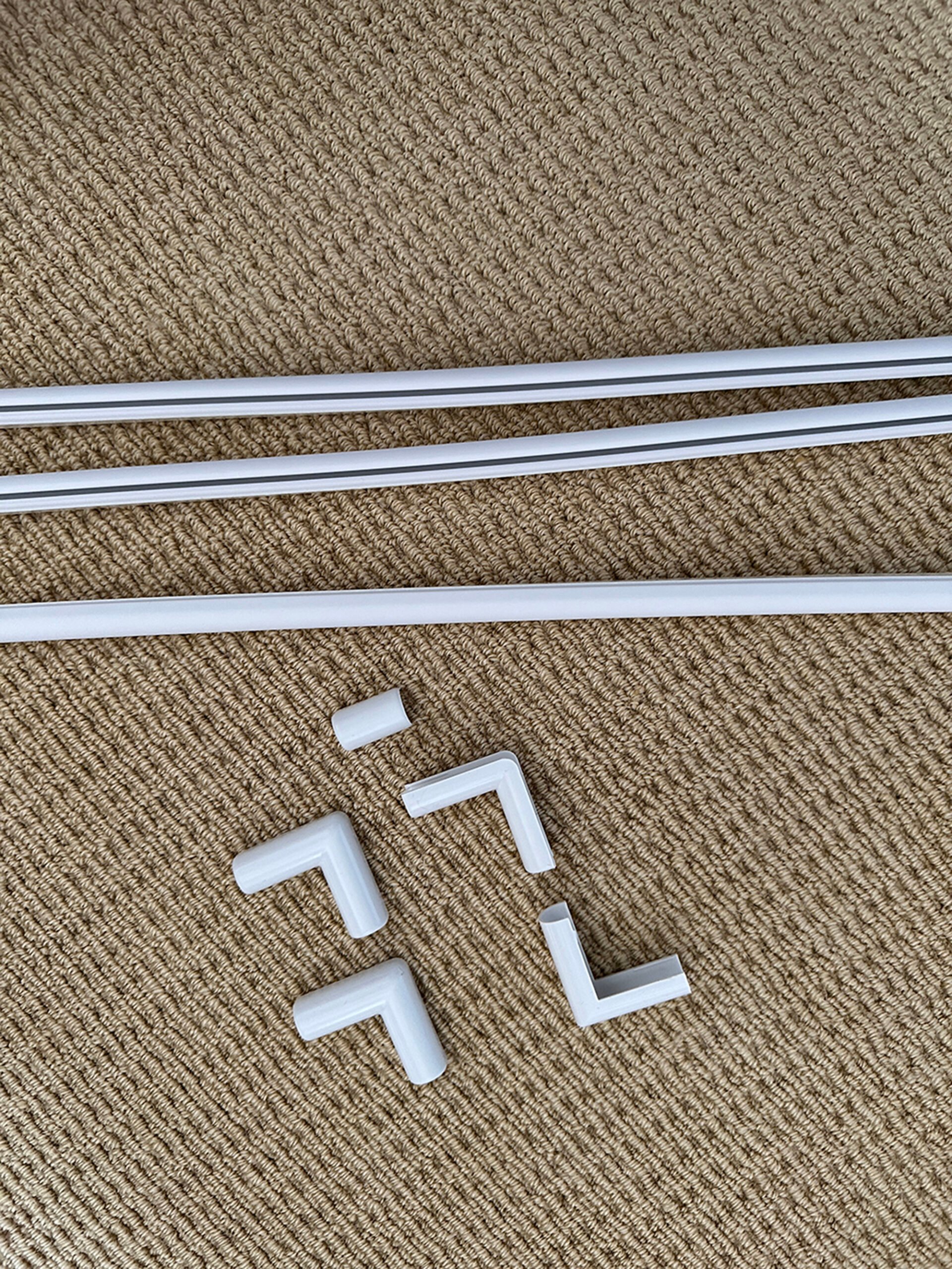 Cord concealing casing from Legrand with adhesive straight pieces and joints