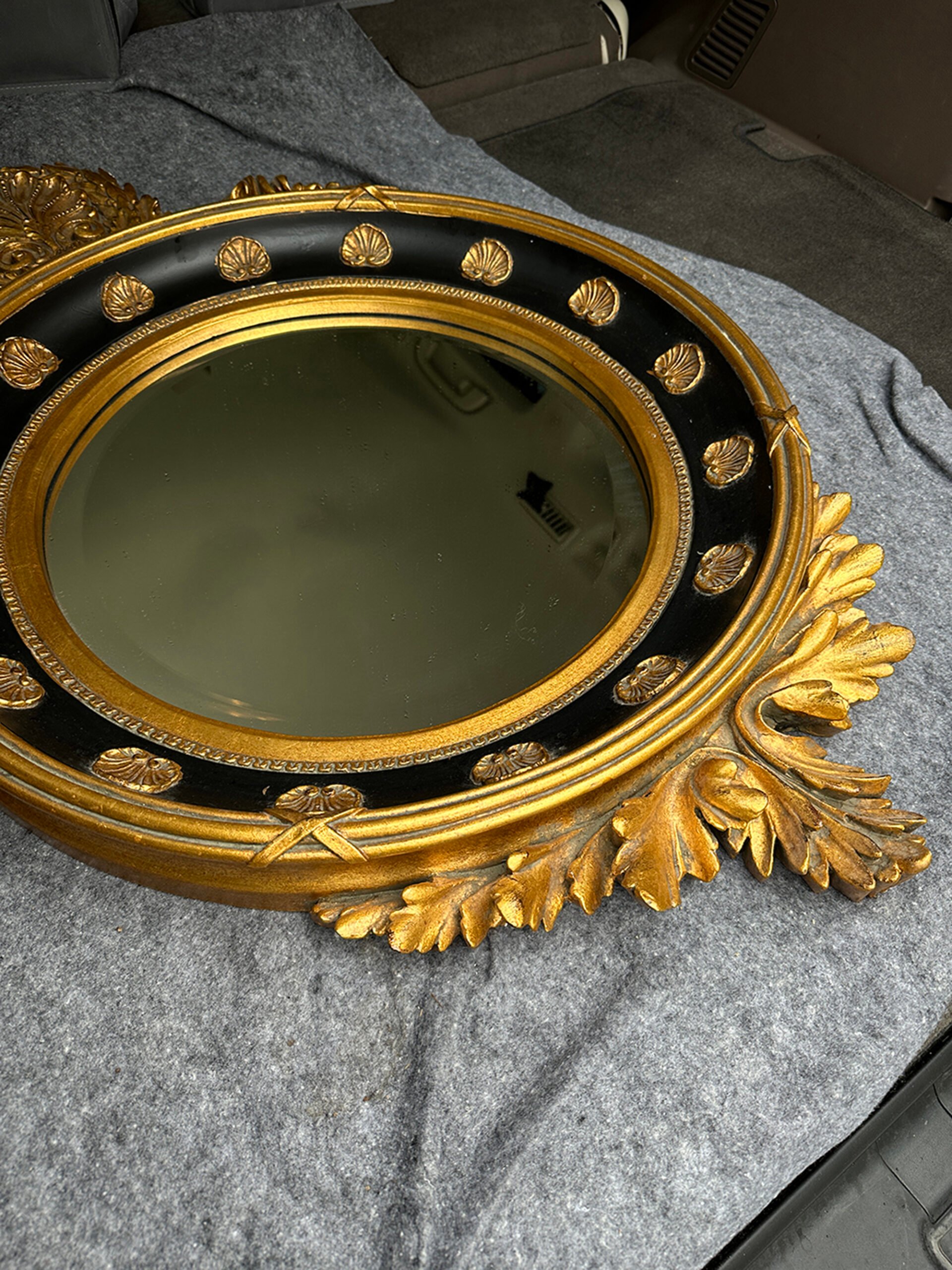 Gilded round antique mirror from an estate sale