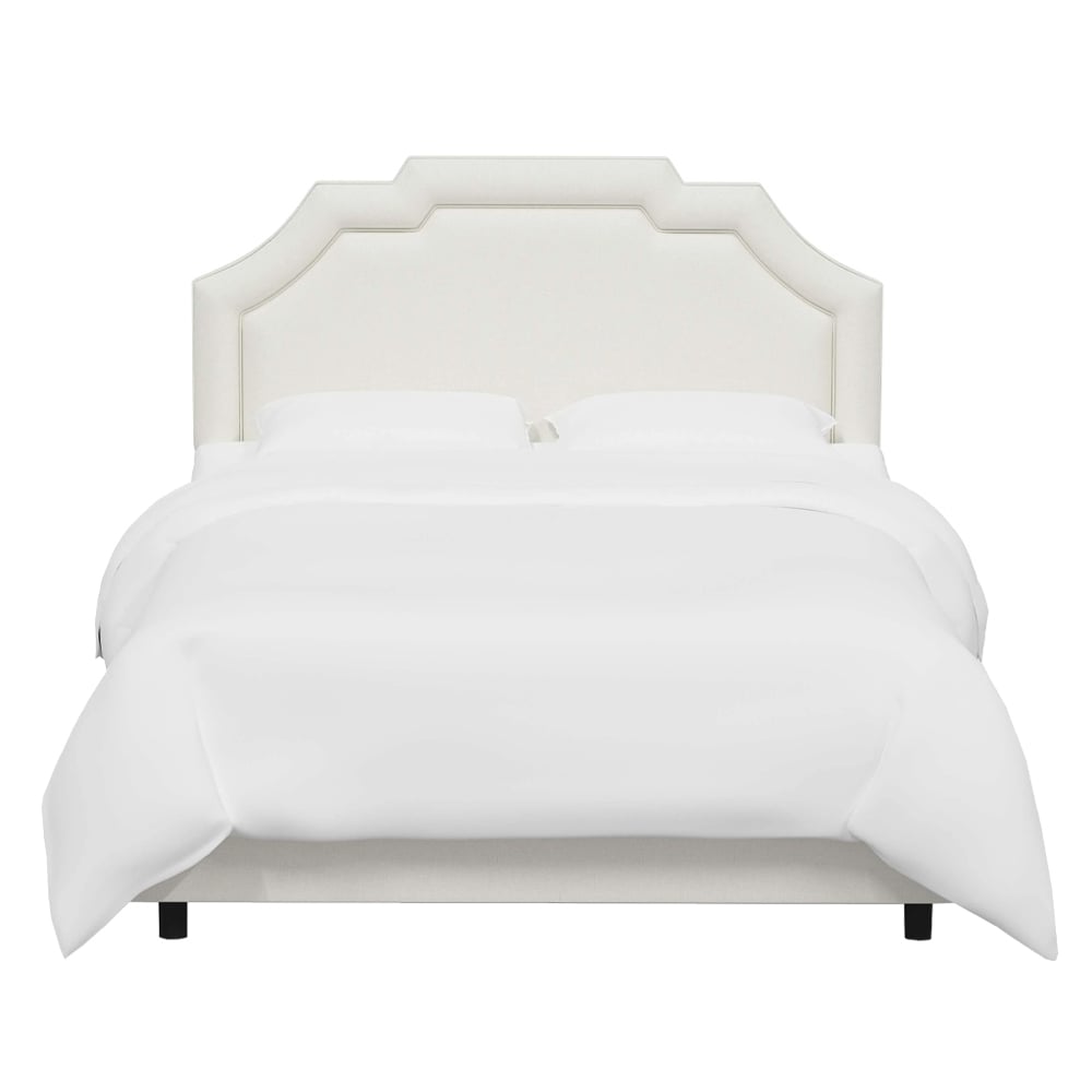 Notched headboard upholstered bed