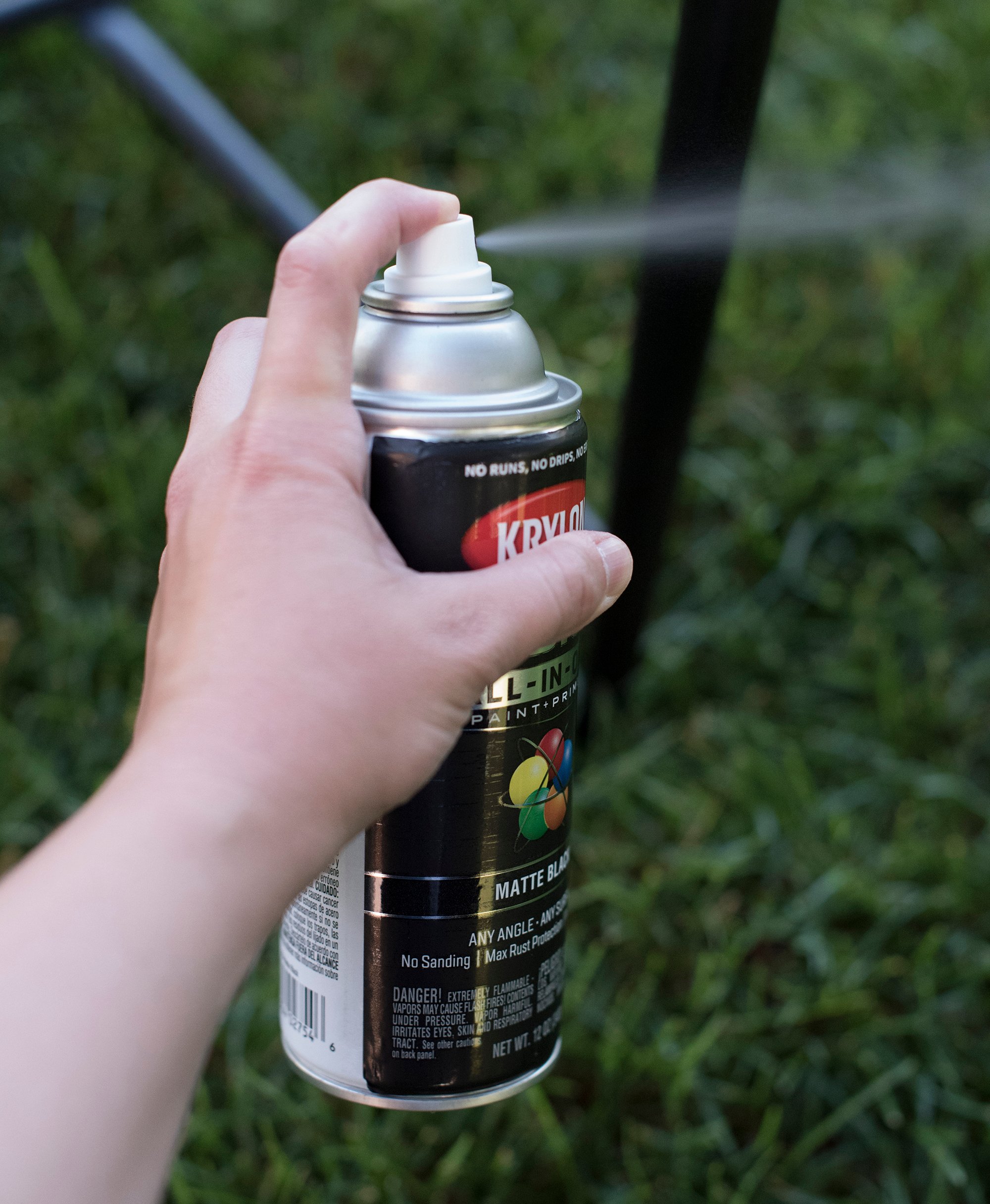 Spray painting patio chairs black