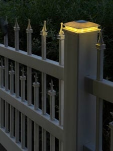 Illuminated solar fence post cap light for a classic and colonial look.
