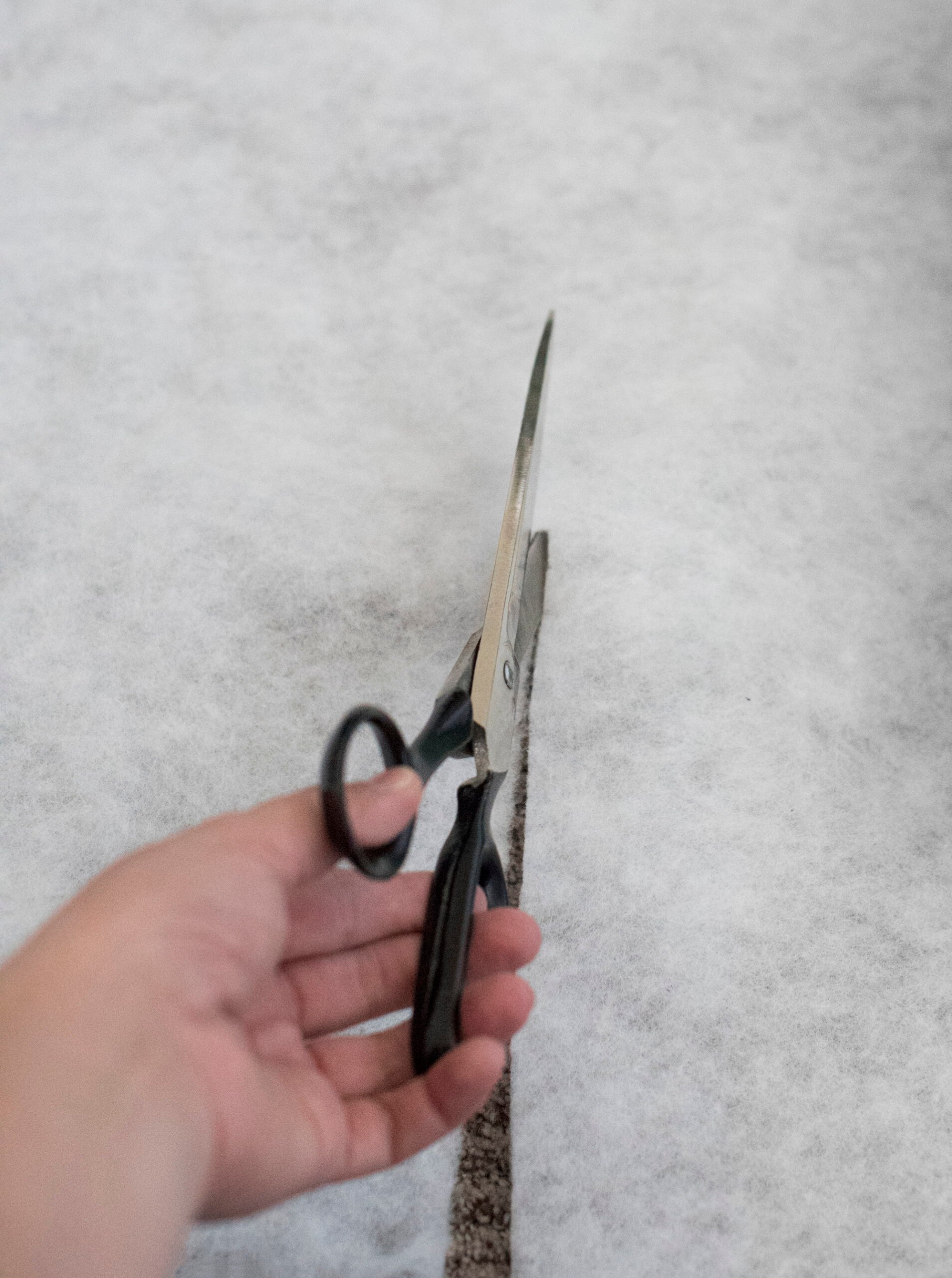 Upholstering acoustic wall panels