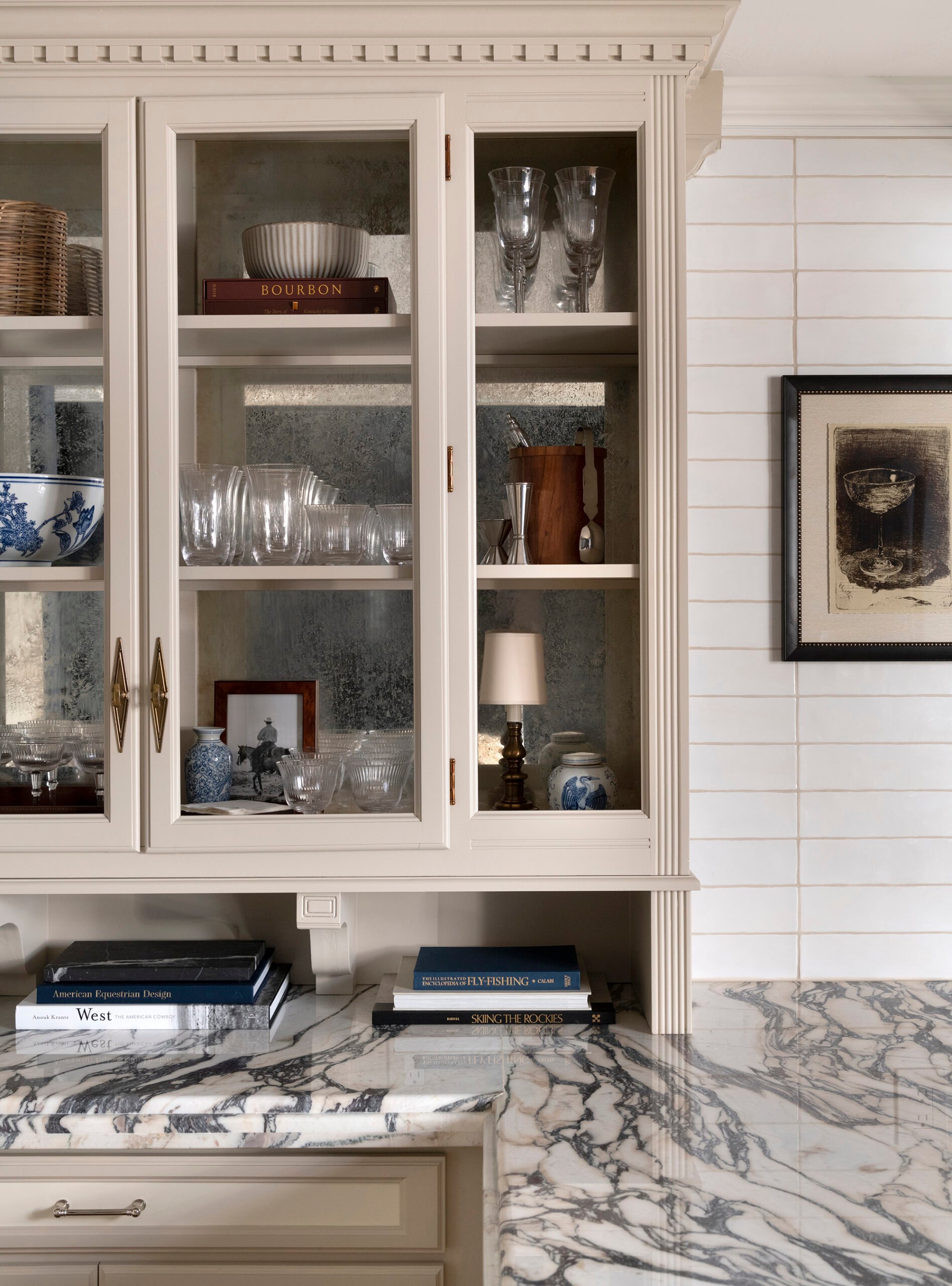 Vintage bar hutch with viola marble countertop and subway tile